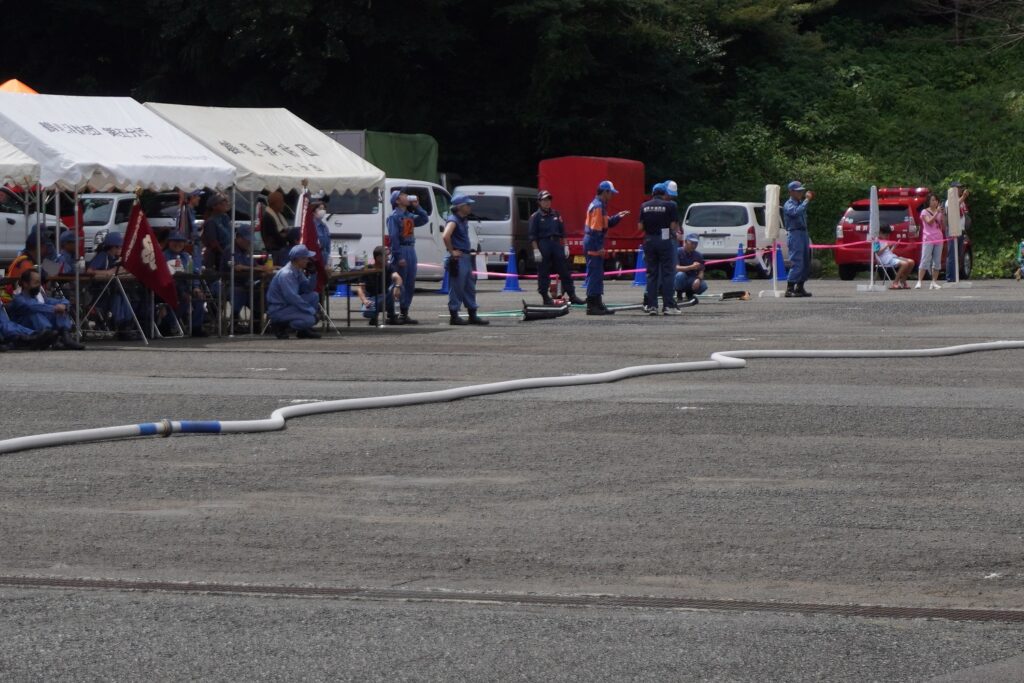 鶴見消防団長いホース